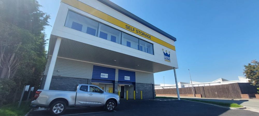 A completed self-storage building with a P3 Plant vehicle parked outside.